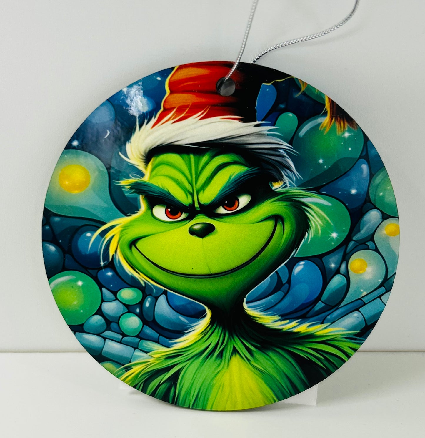 GRINCH FACE DISC ORNAMENT